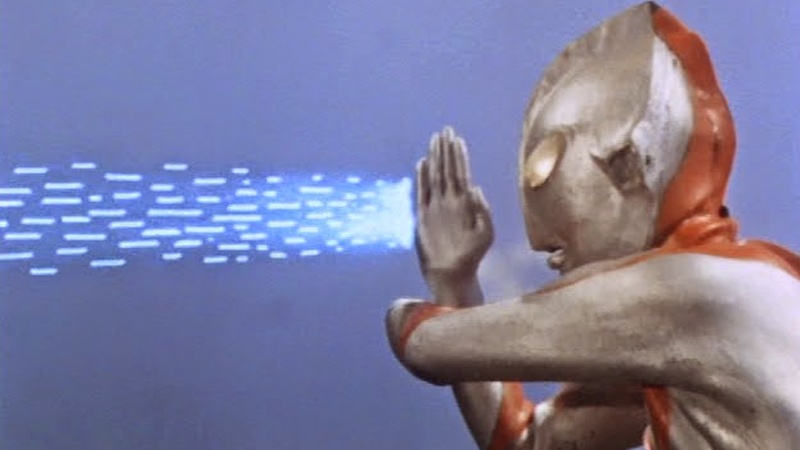 Ultraman fires his iconic ultra beam attack, the Specium Ray.